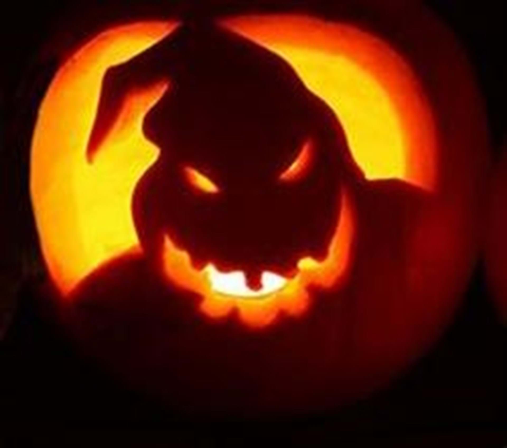 Carved ghost on a pumpkin